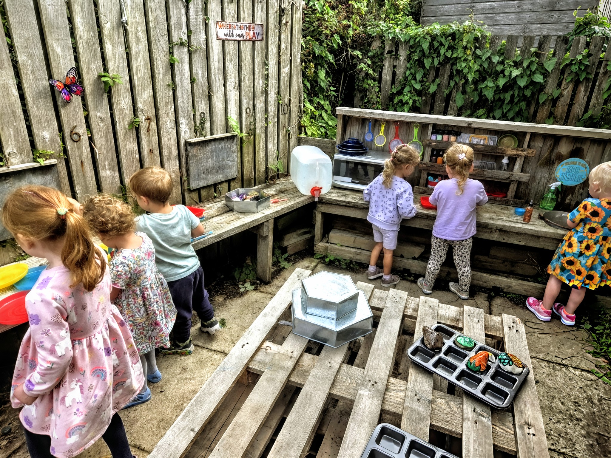 Children enjoying activities at Brambles Nursery