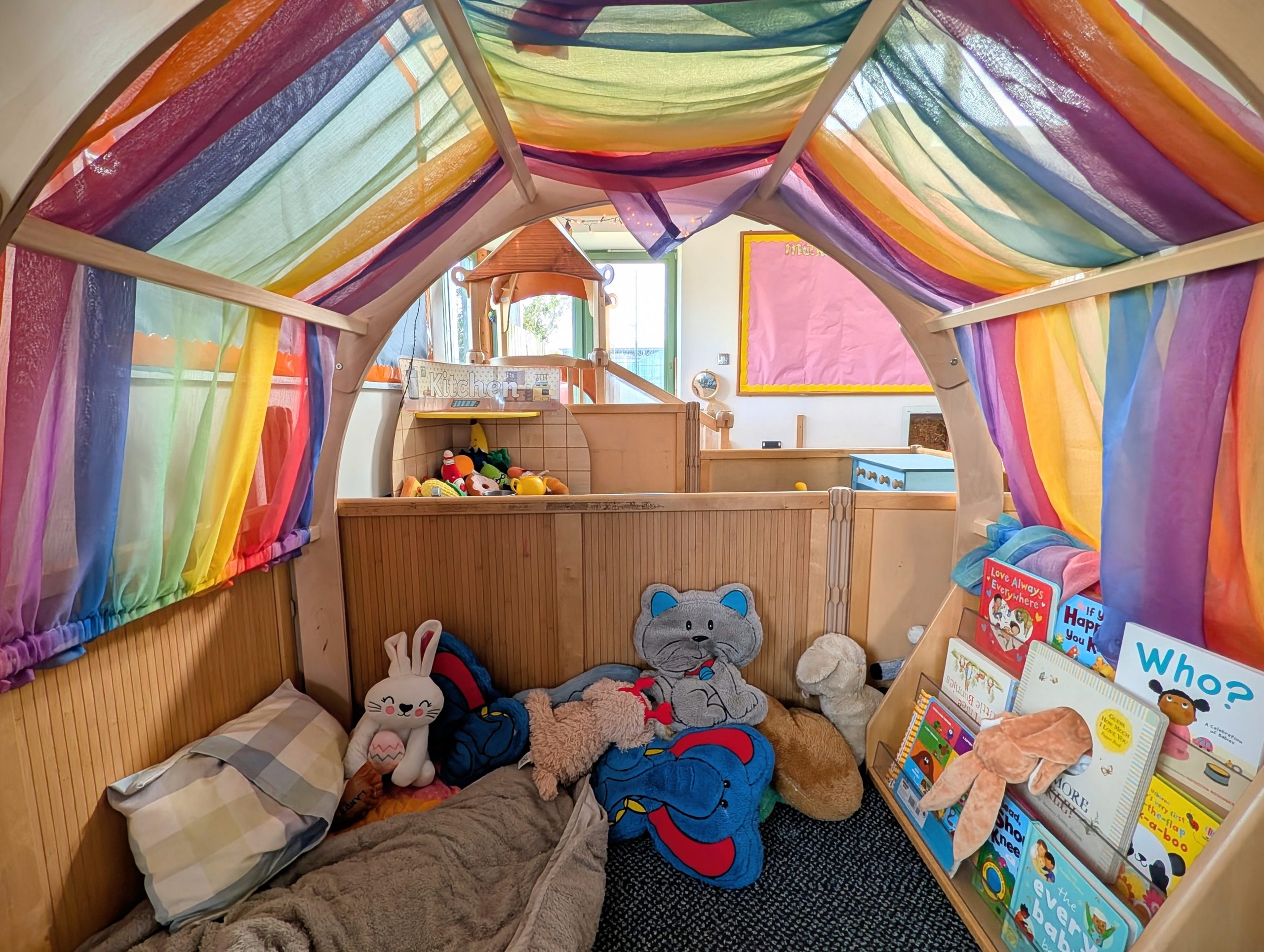 Cosy book and play area in the Dormice Room